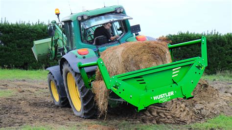 hay unroller for skid steer|mounted bale unroller.